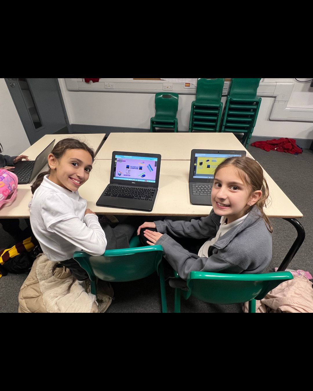 U Teach Mi pupils working on coding projects